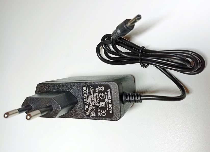 Блок живлення 9V 0.6a з вилкою 3.5х1.35 мм 9V06A-35135 фото